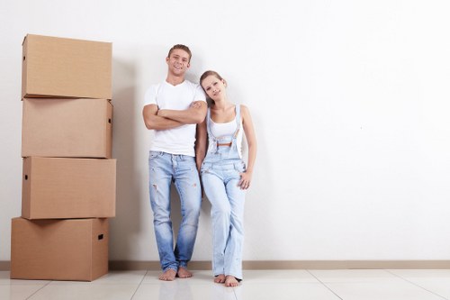 Professional house removals service loading moving boxes in the UK