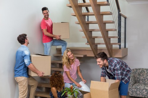 Planning a home move in the UK with boxes and checklist