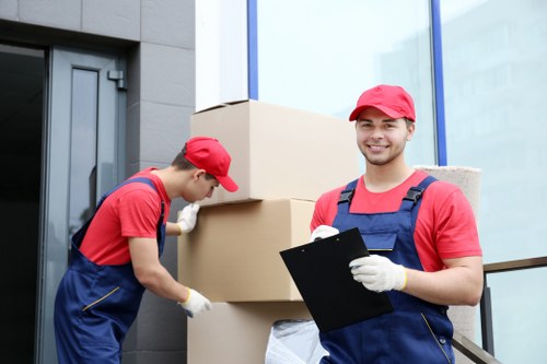 Professional movers loading boxes during a UK relocation