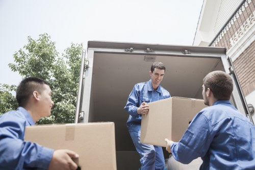 Loading furniture into a moving truck in the UK