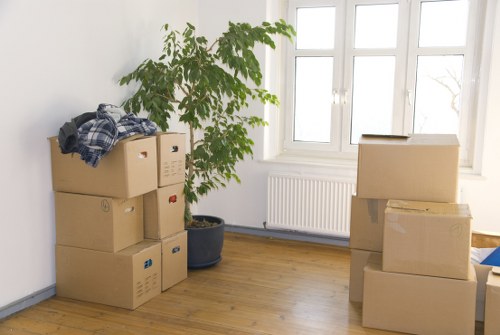 Boxes and furniture loaded for a flat move in a busy area
