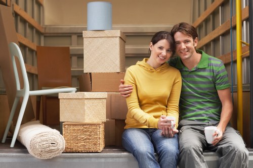 Packed moving boxes and furniture prepared for transport
