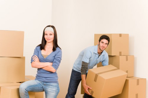 Moving boxes and furniture prepared for a flat removal