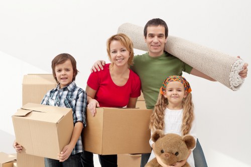 Packed office furniture and boxes ready for commercial relocation