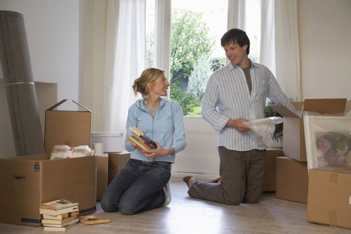 Student moving boxes using a man and van service in the UK