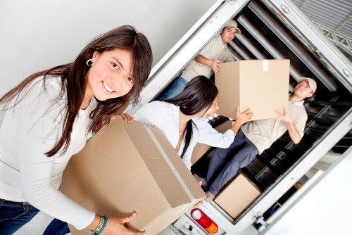 Planning a house move with labelled boxes and a moving checklist